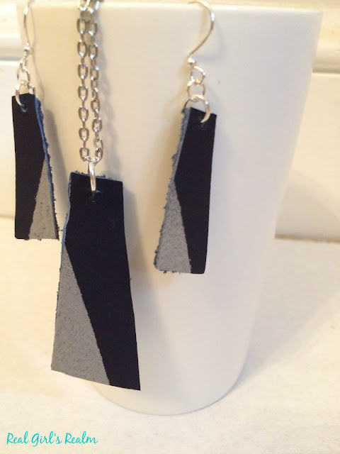 Did you know the Cricut can cut leather? Get the tutorial for a painted leather earrings and  necklace set.