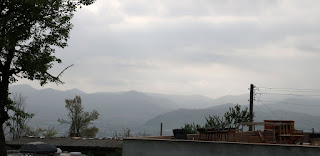 Misty mountains under clouds Misty mountains under clouds