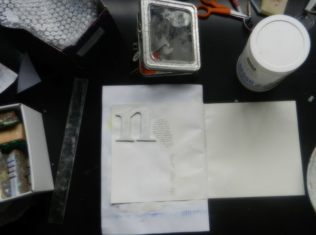 gesso resist in my art journal gessoing to create a background in my art journal