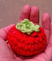 http://www.ravelry.com/patterns/library/tiny-tomato