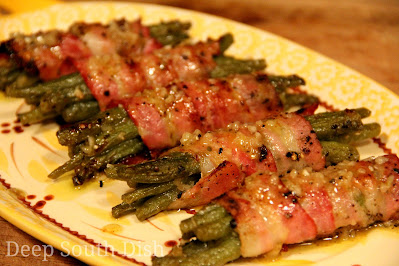 Bundles of fresh green beans, marinated in a seasoned olive oil vinaigrette, wrapped in bacon and broiled, baked or grilled.
