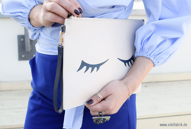 Clutch mit Augen vin C&A Clutch mit geschlossenen Augen von C&A