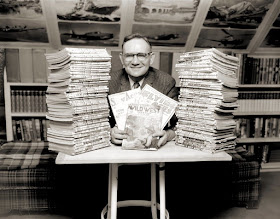 Unidentified collector with pulp magazine collection - Western, Aviation. Looks happy