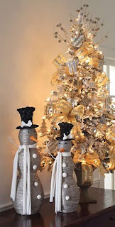 Flat Christmas tree decorated in gold, slim profile tree is great for an apartment or office