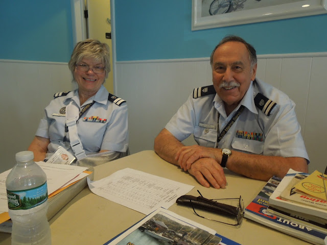 Janet Malzone and Bill Castagno prepared to check students in.