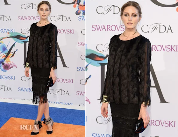 Olivia Palermo wore a black fringed dress by Ann Taylor with Aquazzura Madison sandals, Lulu Guinness clutch