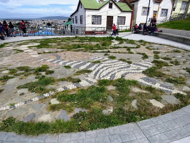 Mosaic featuring the Selk'nam people at Cerro de la Cruz in Punta Arenas