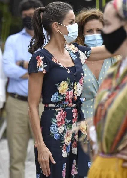 Queen Letizia wore a floral jumpsuit from Uterque, which she had worn before, and espadrille wedges from Macarena