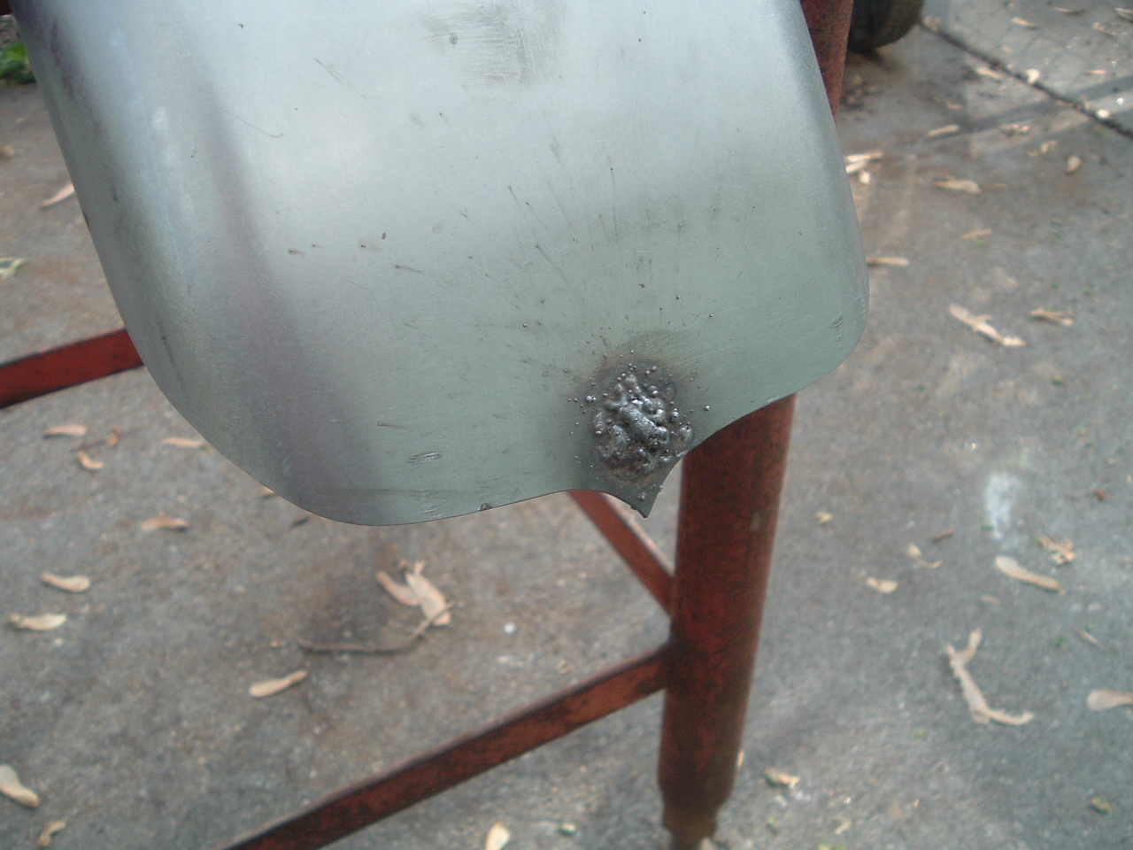 Crying Nines Flux core mig weld, on a trailer fender to fill in some holes