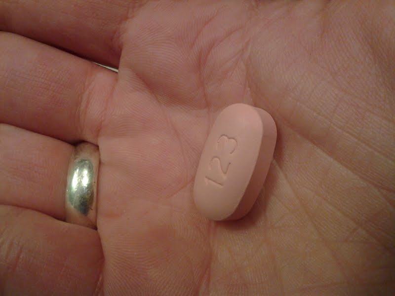 Pill with crown on it