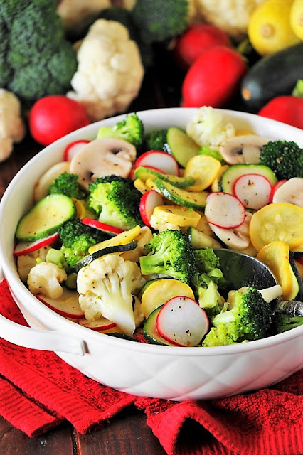 Marinated Summer Vegetable Salad Image ~ Zucchini, yellow summer squash, broccoli, cauliflower, fresh mushrooms, & radishes in a lemony dressing marinade. It's sure one flavor-packed way to enjoy your vegetables!