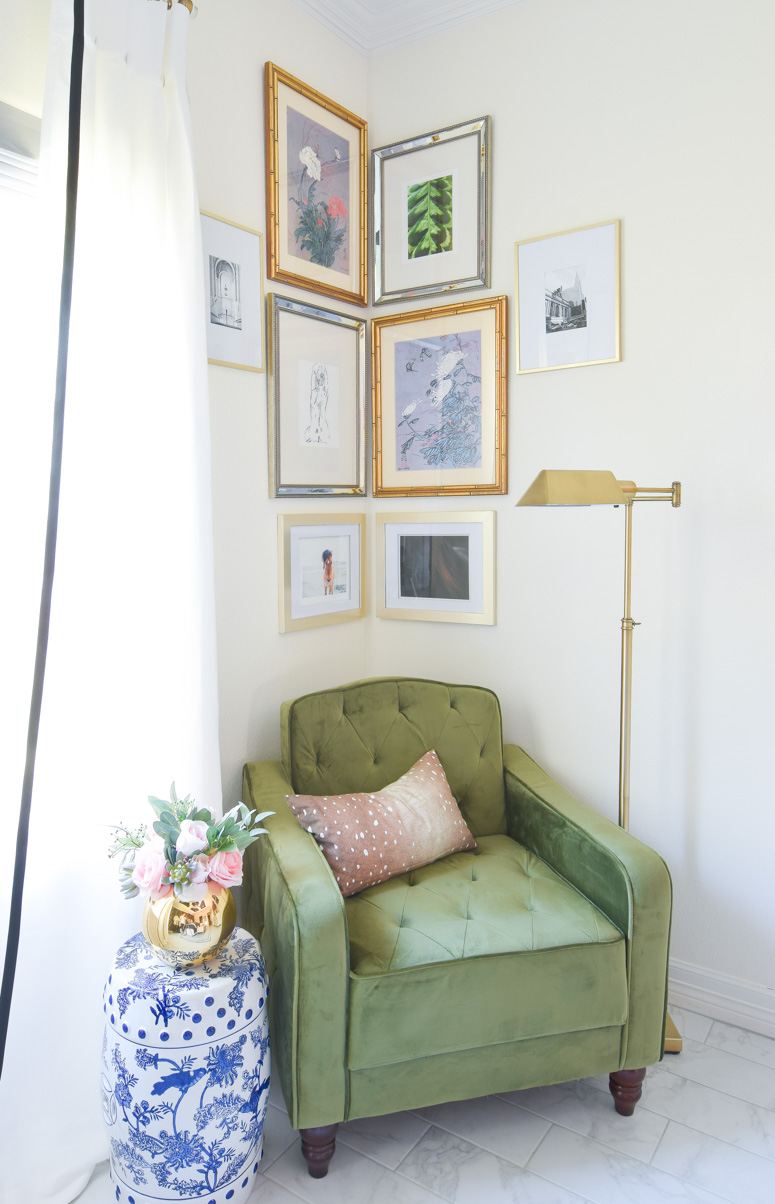 This olive green vintage tufted chair adds a pop of color to a silver and gold corner gallery wall and reading nook in this stunning master bedroom. This olive green vintage tufted chair adds a pop of color to a silver and gold corner gallery wall and reading nook in this stunning master bedroom.