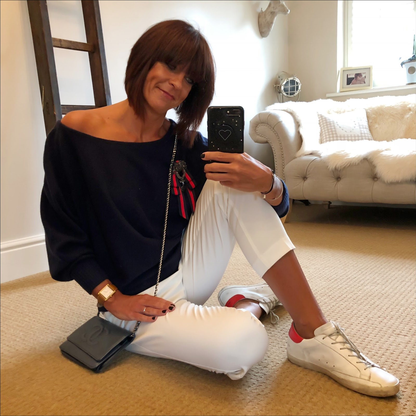 my midlife fashion, military brooch, iris and ink off the shoulder cashmere jumper, chanel wallet on chain, marks and spencer tapered trousers, golden goose superstar low top leather trainers