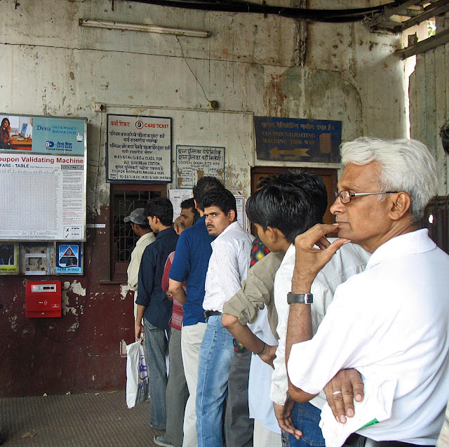 queue at ticket counter at mumbai railway station