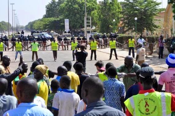 anti-government protesters in Burkina Faso today set their National parliament ablaze 