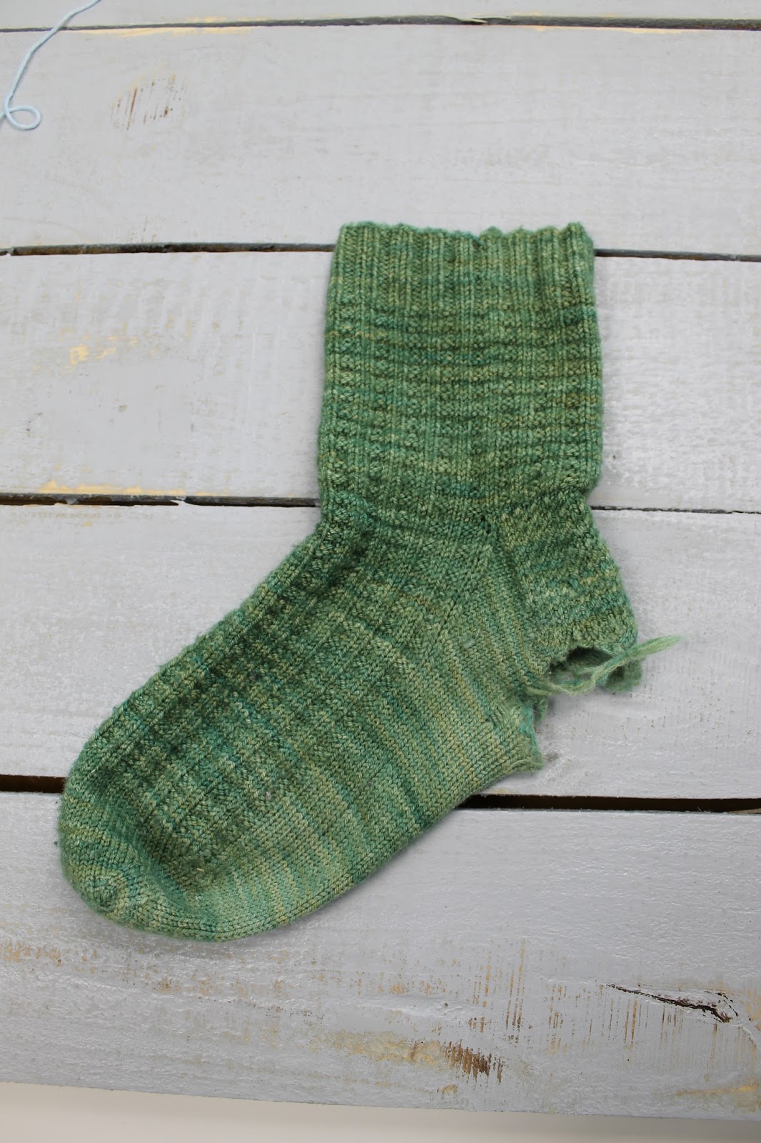 The Feisty Redhead Patching a Huge Hole in Knit Socks