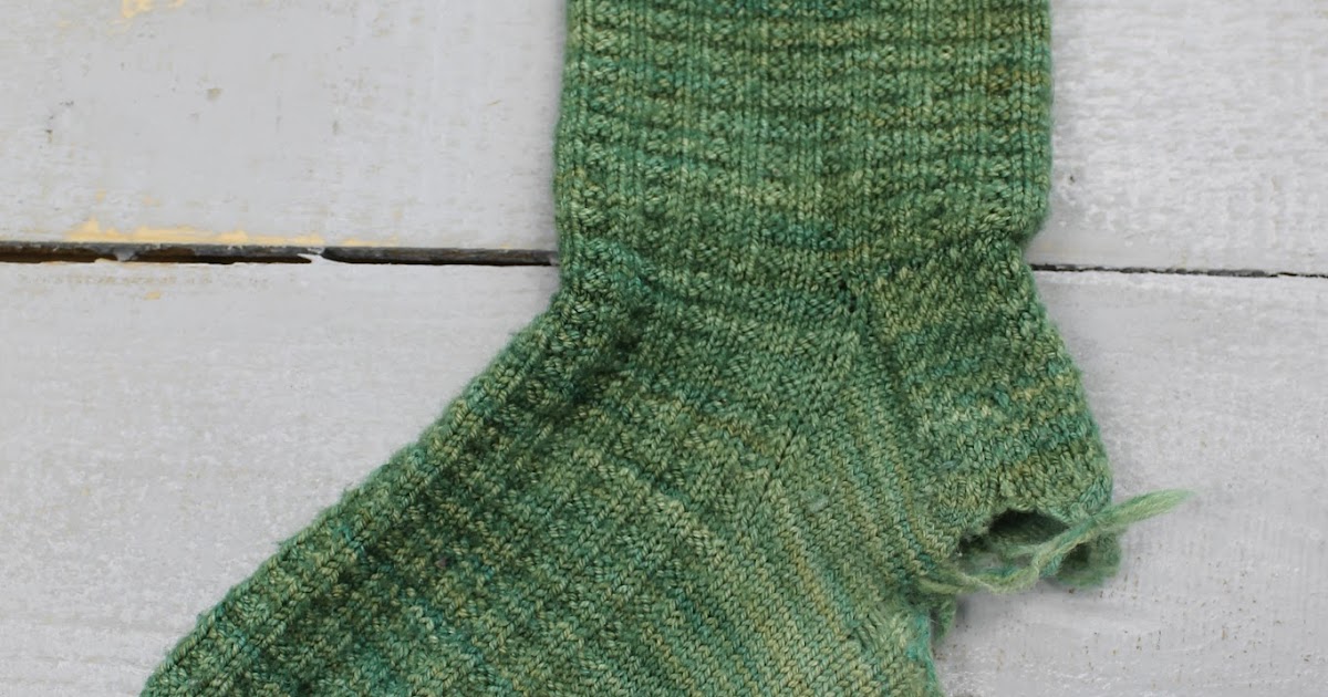 The Feisty Redhead Patching a Huge Hole in Knit Socks