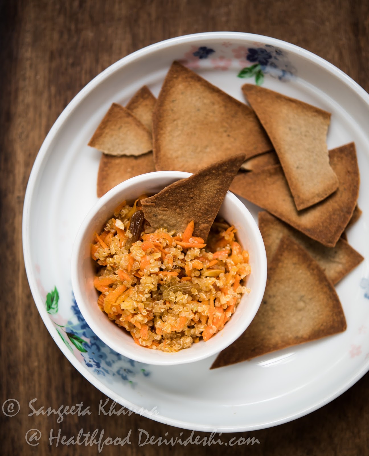 Quinoa salad with carrots, walnuts and raisins