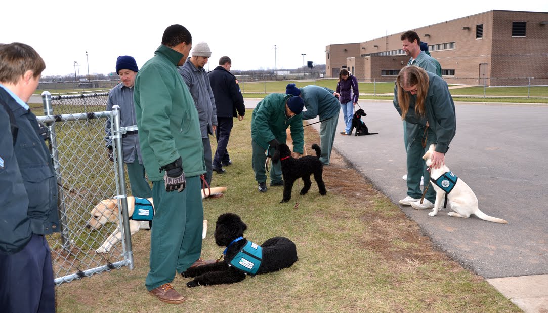 PRISON DOG PROGRAMS BRIDGES and PATHWAYS of COURAGE