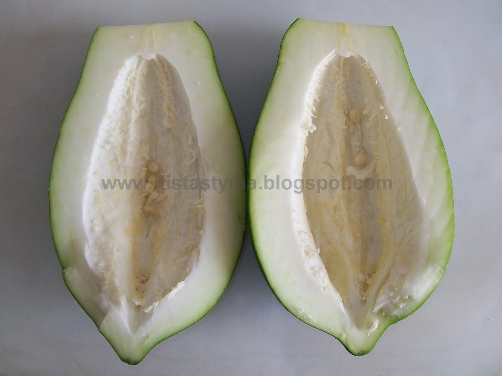 It is tasty ma! Raw Papaya Delight (Papaya Ghonto)