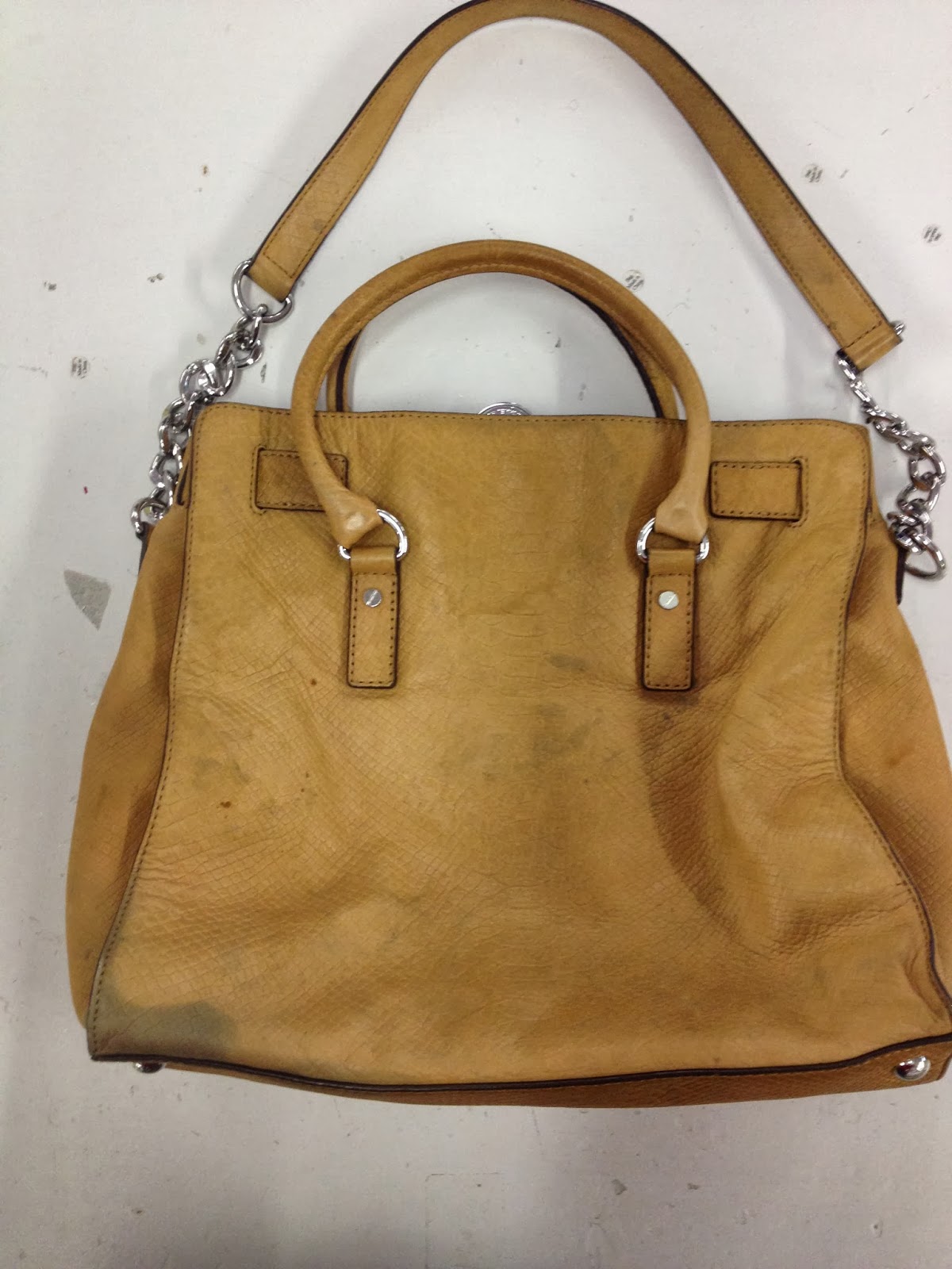 handbag restoration cost