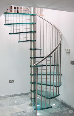 space saving spiral staircase design for small homes