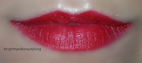 Swatch of M.A.C Russian Red Lipstick Swatch of M.A.C Russian Red Lipstick- indoor lighting, lighter application