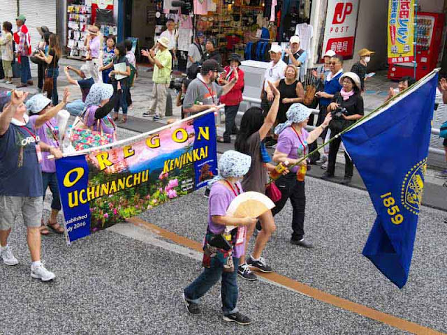 Oregon visitors marching on Kokusai Street, Naha, Okinawa