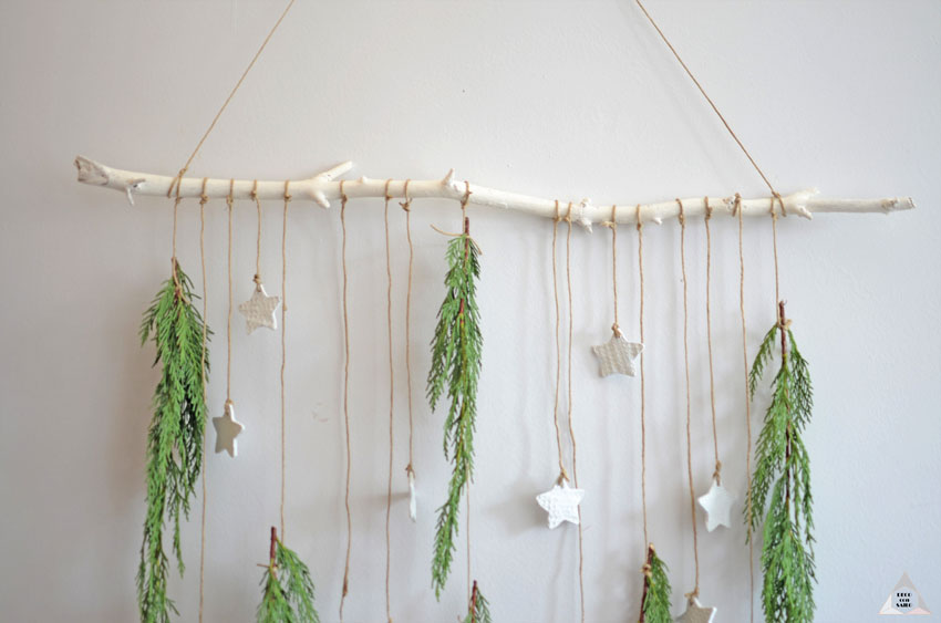 decoracion navideña con estrellas y ramas