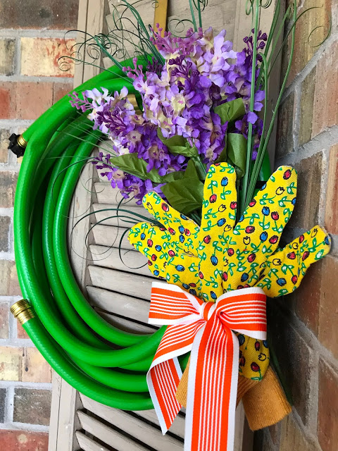 DIY spring garden hose wreath