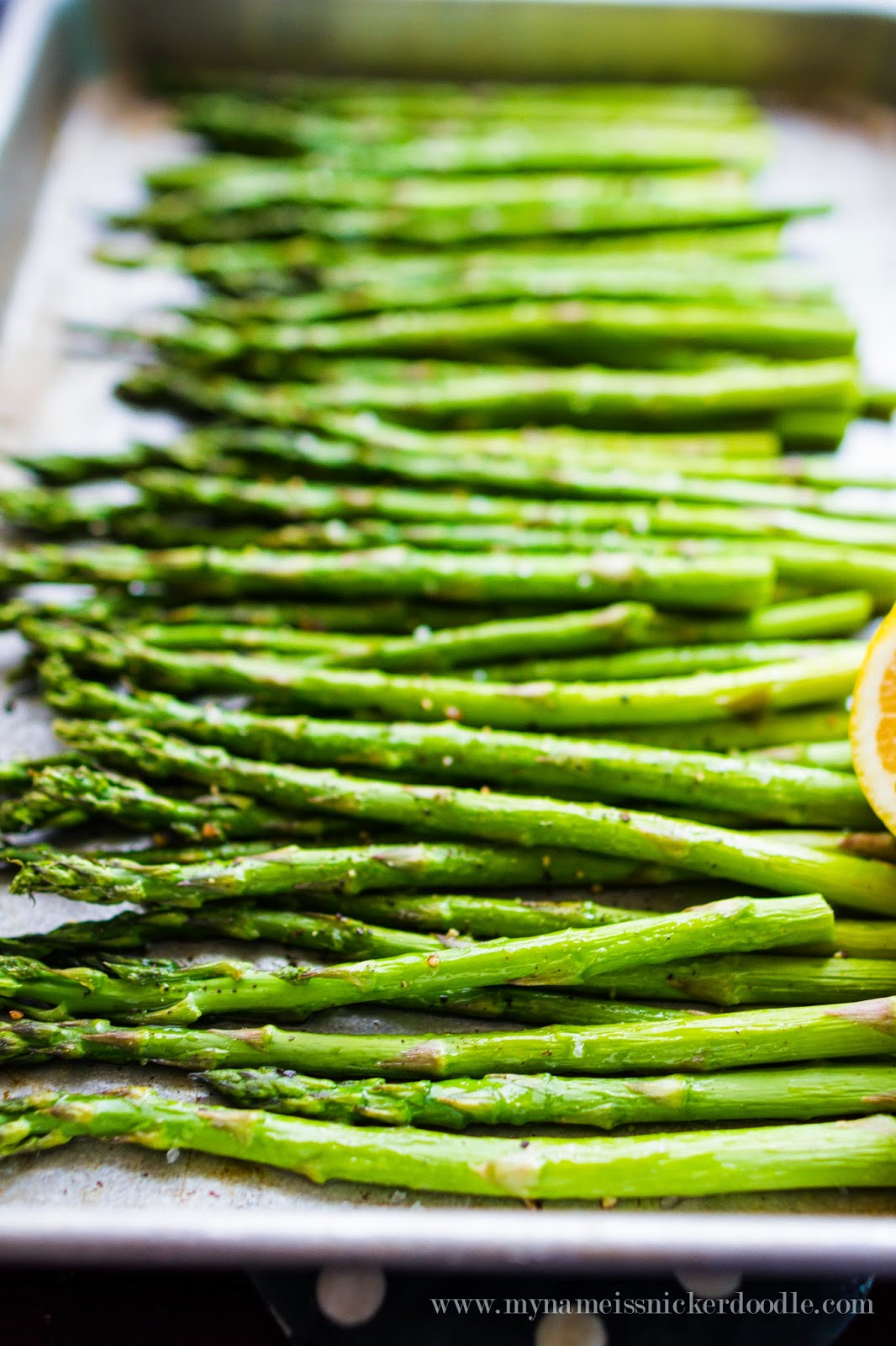 Totally easy and simple roasted asparagus that only takes minutes to prepare and cook! It's perfect side dish for an Easter or Sunday meal. | mynameissnickerdoodle.com Totally easy and simple roasted asparagus that only takes minutes to prepare and cook! It's perfect side dish for an Easter or Sunday meal. | mynameissnickerdoodle.com