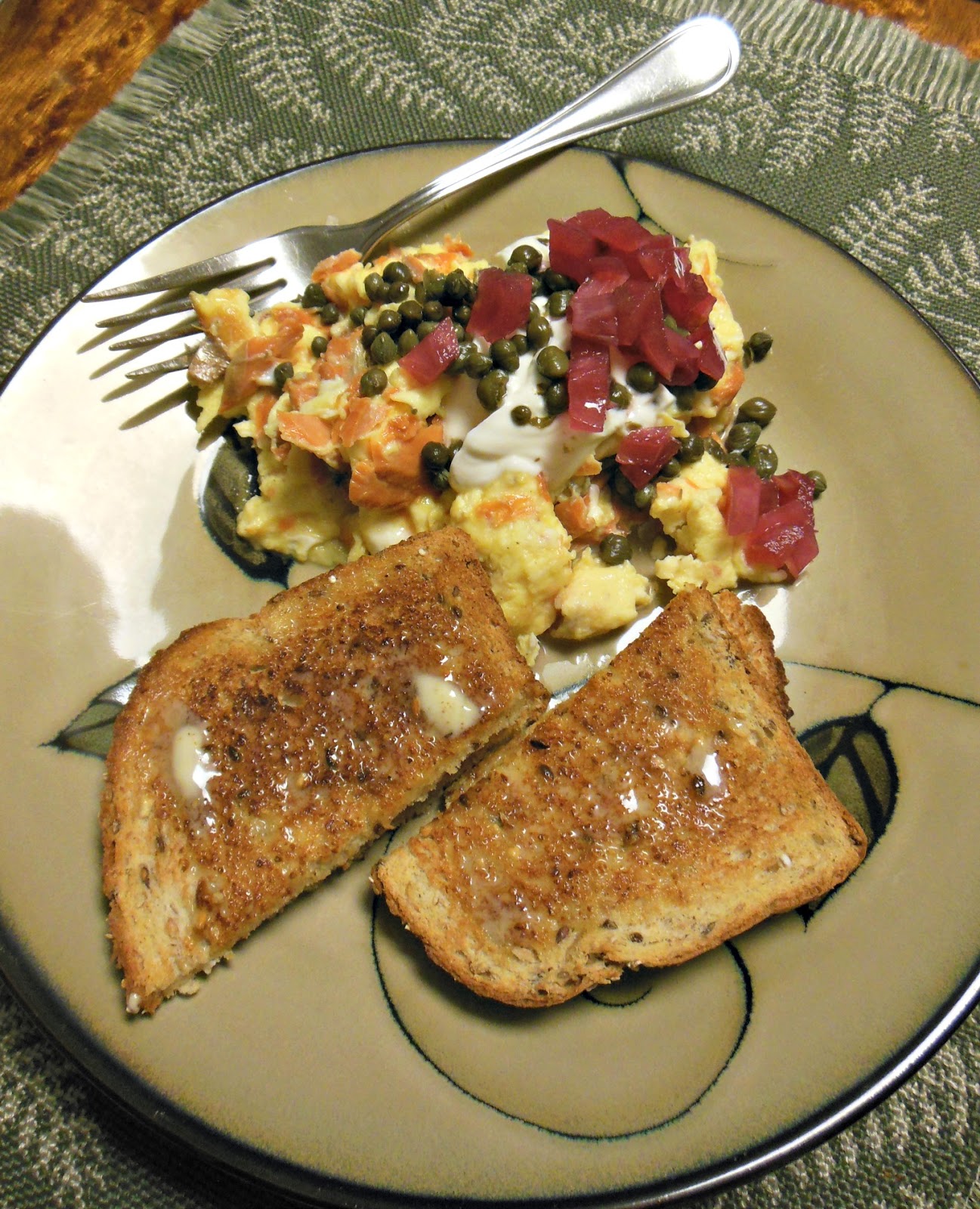 Scrambled Eggs with Smoked Salmon, Sour Cream, Pickled Red Onions and