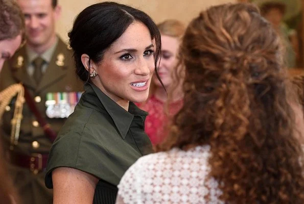 The Duchess wore a green maxi dress by US designer Brandon Maxwell. The Duchess wore Princess Diana’s gold and diamond butterfly earrings