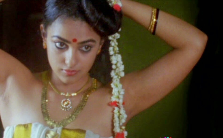 Actress Nithya Menon Stills Hd In Tamil Malayalam Telugu Top Hot Actress Cinestills