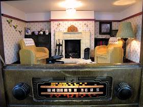 Close up of a miniature scene of a 1940s lounge in a vintage radio.