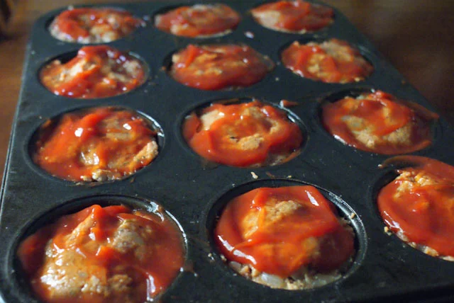 Meatloaf Muffins cooked in a muffin tin. Perfect for a weeknight dinner since they cook in just 25 minutes!