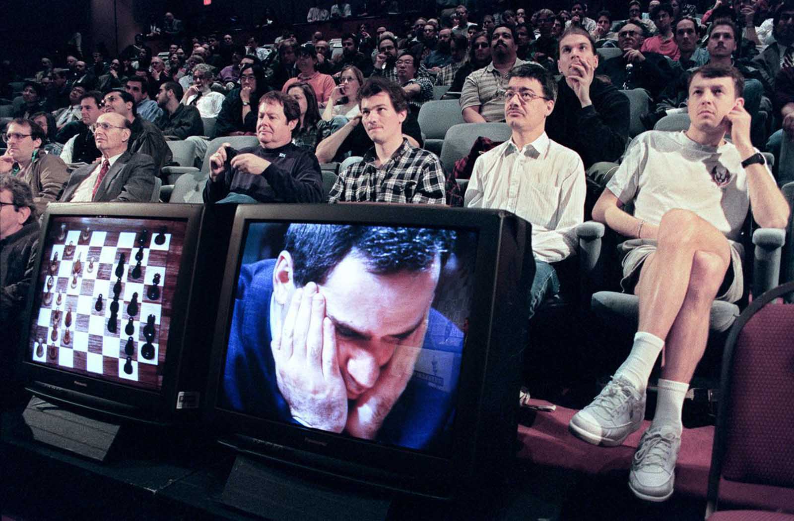 Spectators watch a live broadcast of Game 3.