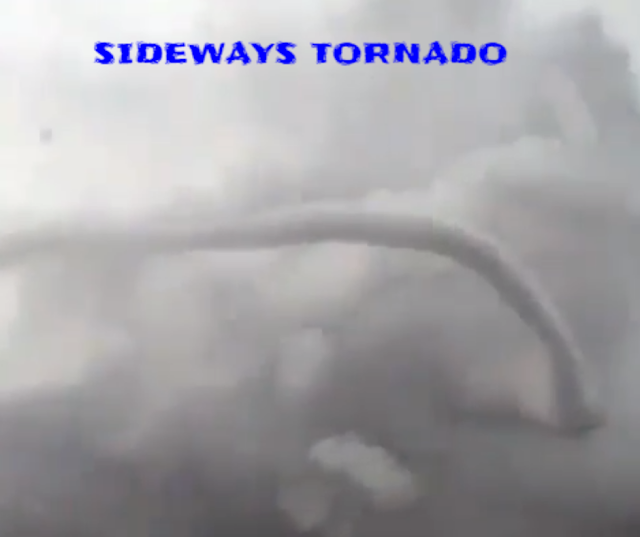 Sideways tornado opens up and a guy just wants to stand and film it in front of him. Sideways tornado opens up and a guy just wants to stand and film it in front of him.