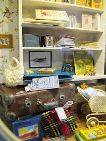 One-twelfth scale scene 1940s items on a shelf.