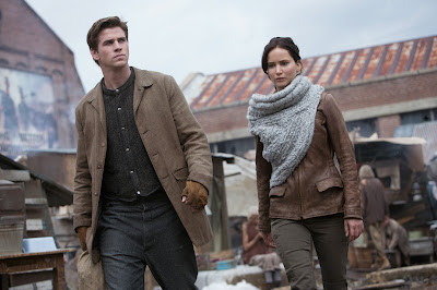 Liam Hemsworth and Jennifer Lawrence in The Hunger Games: Catching Fire