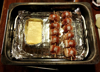 bacon bites and cheese in smoker