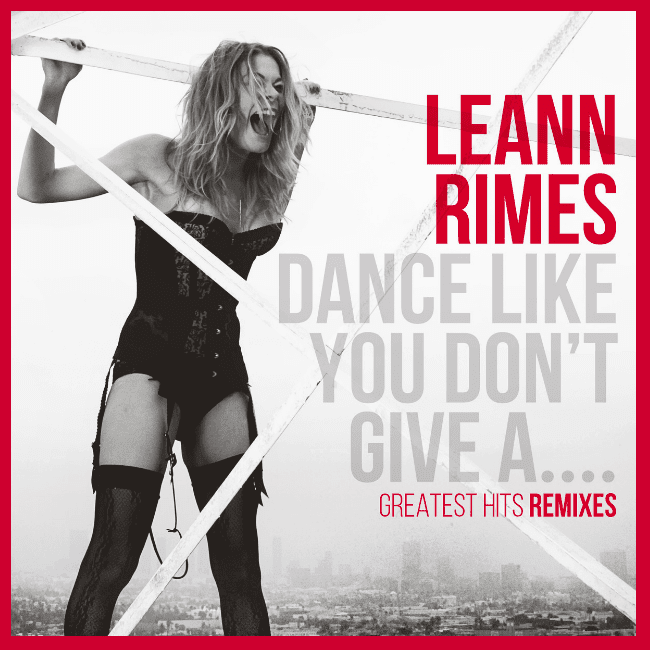 This is the cover art for LeAnn Rimes latest music album, and it features her hanging onto a sign in the Hollywood Hills overlooking Los Angeles, and she is wearing a corset and stockings and she is screaming at the top of her lungs.  