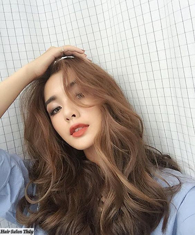 Tóc dài xoăn sóng kieu toc ca tinh cho mua thu