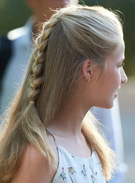 Princess Leonor wore Mango floral print top and trousers, Queen Letizia wore a pink floral print v-neck summer dress