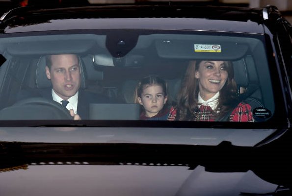 The Duchess of Cambridge wore a pleated tartan dress by Emilia Wickstead. Princess Charlotte. Meghan Markle and Prince Harry