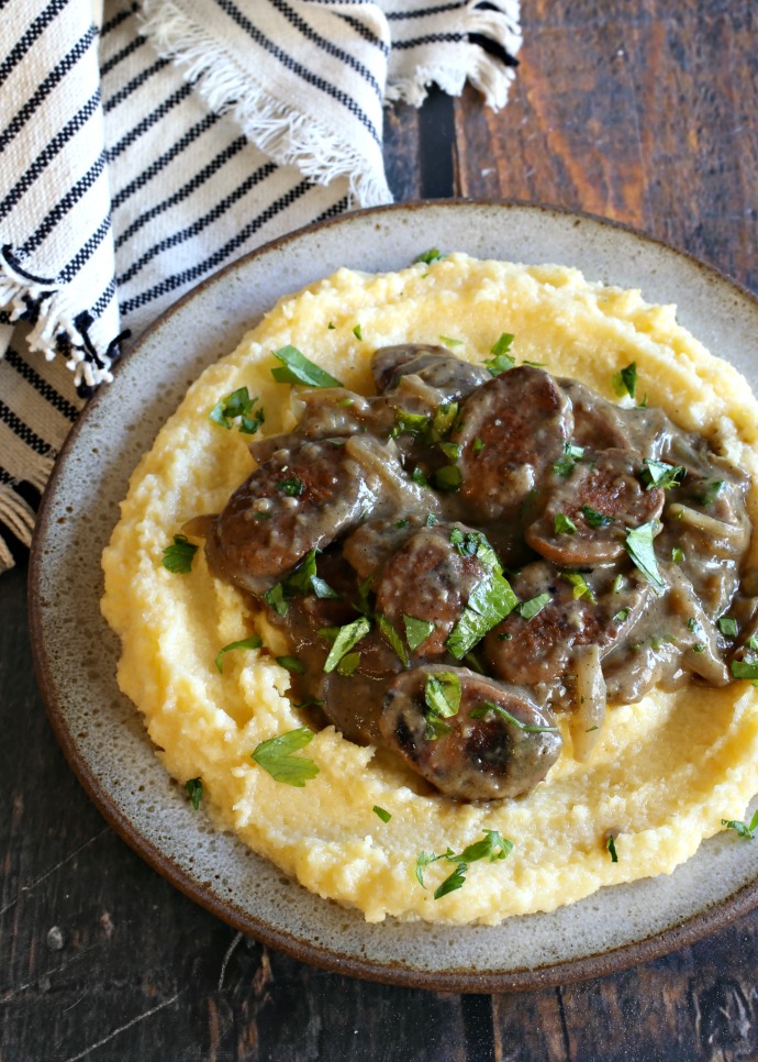 Chicken sausages served over creamy polenta with an onion pan gravy.