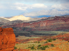 The Henry Mountains and the Waterpocket Fold from the Gooseneck Overlook at sunset, Utah