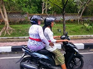 Indonesian women on the scooter