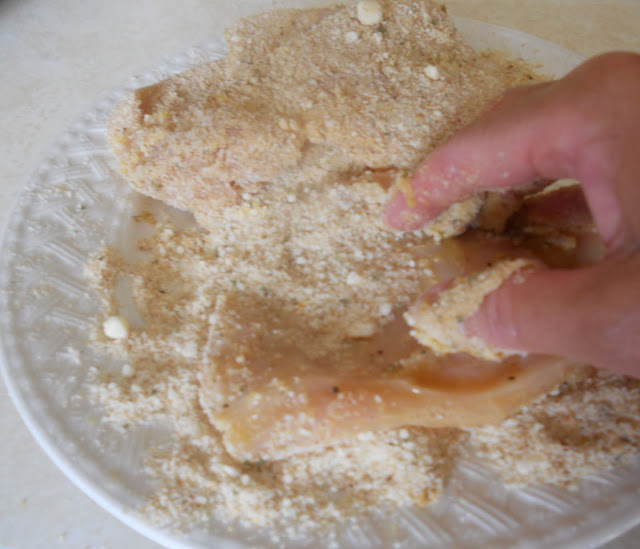 Using one hand, coat both sides of each piece of chicken in the bread crumb mixture. How to coat a chicken breast with bread crumbs.