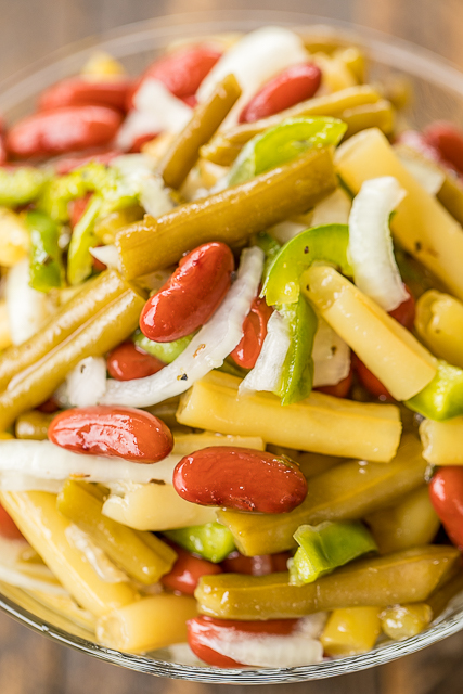 Three Bean Salad - so quick and delicious!! Green Beans, Yellow Wax Beans, Kidney Beans, Vidalia Onion, Green Bell Pepper tossed in sugar, cider vinegar, oil, salt and pepper. Make in advance in refrigerate until ready to serve. Great for potlucks and cookouts! #salad #sidedish #beans #nobake Three Bean Salad - so quick and delicious!! Green Beans, Yellow Wax Beans, Kidney Beans, Vidalia Onion, Green Bell Pepper tossed in sugar, cider vinegar, oil, salt and pepper. Make in advance in refrigerate until ready to serve. Great for potlucks and cookouts! #salad #sidedish #beans #nobake